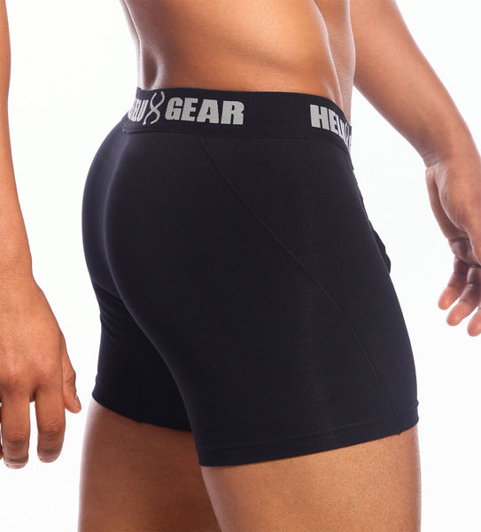 Back view of black boxer briefs laid flat on a white background.